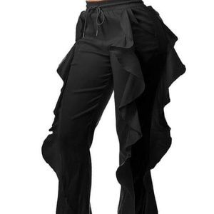 Black joggers with ruffles